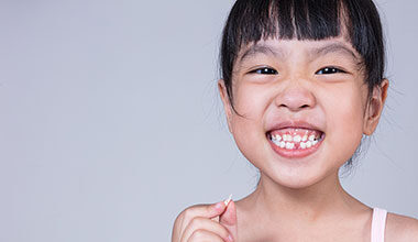 girl with missing tooth